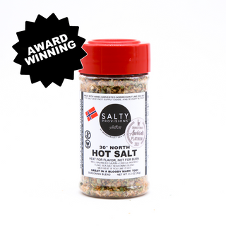 A jar of 30° North Hot Salt with a red lid, labeled as an award-winning product from Salty Provisions.