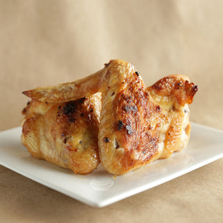 This is a picture of a roasted chicken that features the Salty Provisions Roasted Garlic Sea Salt Blend.