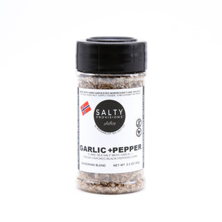 A shaker bottle of Norwegian Flaky Sea Salty Infused with Garlic and mixed with Pepper. Made for you by Salty Provisions.
