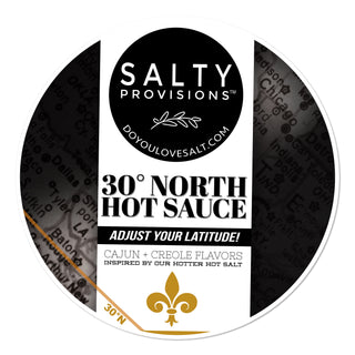 Label of 30° North Hot Sauce by Salty Provisions, featuring a black and white design with text and a Norwegian Flake Sea Salt icon.